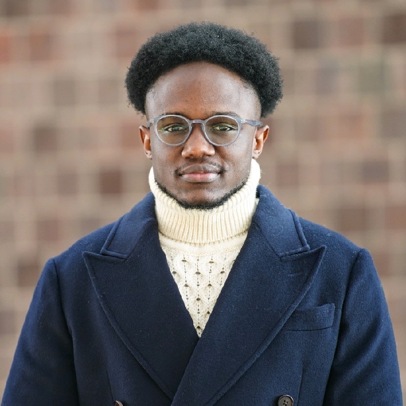 Headshot of Kevin Tusiime, CodePath Alumni